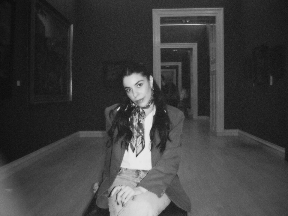 Black-and-white portrait of Lanna, founder of Maia Studio